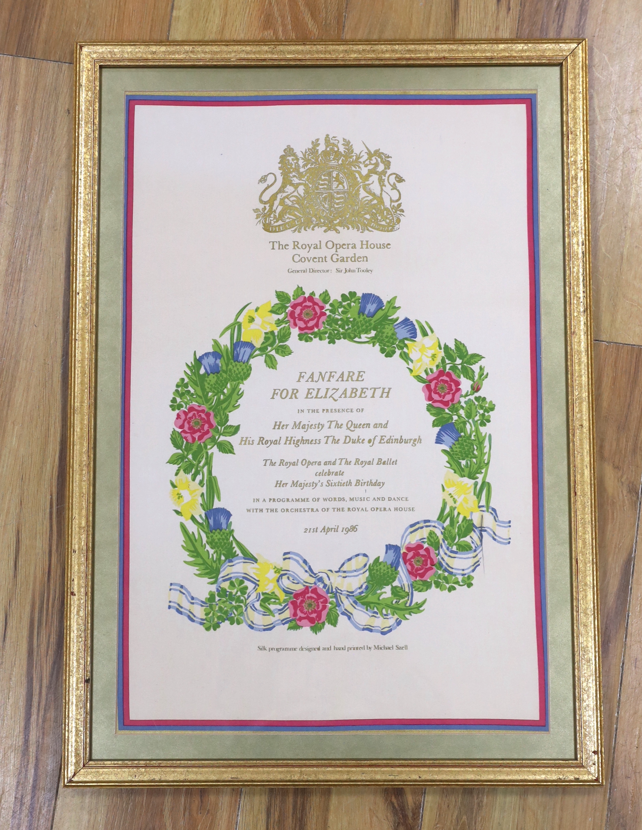 A vintage silk Royal Opera Covent Garden programme, Fanfare for Elizabeth II, 21st April, 1986, designed by Michael Szell, original envelope verso, 57 x 37cm